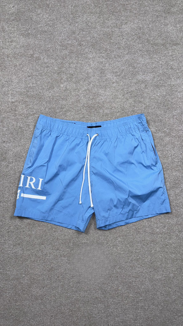 Amiri Baby Blue MA Bar Swim Trunks